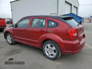 2009 Dodge Caliber SXT with VIN 1B3HB48CX9D108152, listed as a Copart auction lot 81012064 with 189,650 mi miles and Salvage Title. Bid and sale history available at DreamBid. Image 2.