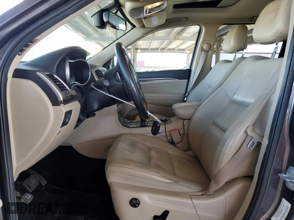 2014 Jeep Grand Cherokee Limited with VIN 1C4RJFBG7EC588986, listed as a Copart auction lot 52284405 with 92,702 mi miles and Salvage Title. Bid and sale history available at DreamBid. Image 7.