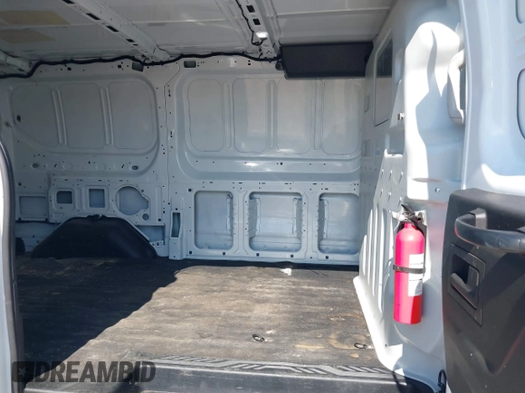 2018 Ford Transit z VIN 1FTYE1ZM0JKB51992, wystawiony jako IAAI lot #42243487 z przebiegiem 123 456 mil mil oraz . Historia ofert i sprzedaży dostępna na DreamBid. Obrazek 8.