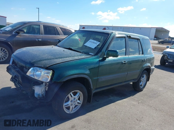 2000 Honda CR-V EX with VIN JHLRD176XYC035377, listed as a IAAI auction lot 41694054 with 196,985 mi miles. Bid and sale history available at carsss.com. Image 19.
