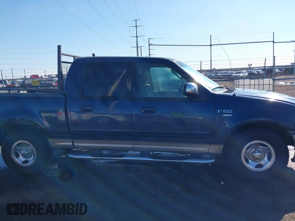 2002 Ford F-150 XLT with VIN 1FTRW07692KC25069, listed as a IAAI auction lot 41387047 with 208,811 mi miles. Bid and sale history available at carsss.com. Image 13.