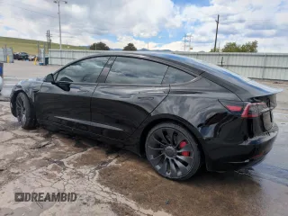 2023 Tesla Model 3 Performance z VIN 5YJ3E1ECXPF628019, wystawiony jako Copart lot #53554215 z przebiegiem 22 557 mil mil oraz Szkoda całkowita • Salvage title. Historia ofert i sprzedaży dostępna na DreamBid. Obrazek 2.