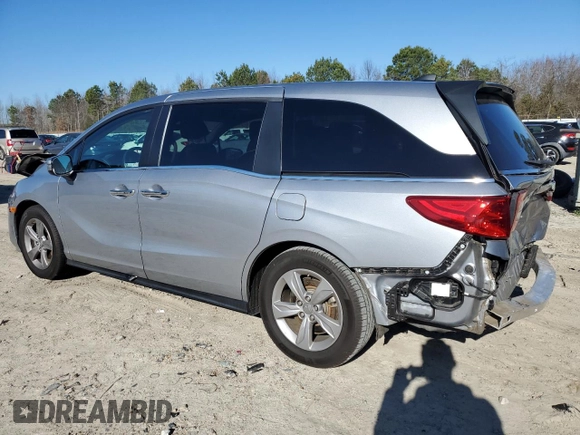 2020 Honda Odyssey EX-L with VIN 5FNRL6H73LB056720, listed as a Copart auction lot 87205024 with 60,219 mi miles and Salvage Title. Bid and sale history available at carsss.com. Image 2.