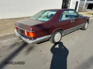 1986 Mercedes-Benz 560 with VIN WDBCA45D2GA206016, listed as a Copart auction lot 54577205 with 205,332 mi miles and Clean Title. Bid and sale history available at DreamBid. Image 4.