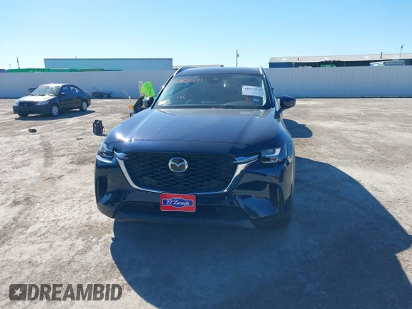 2024 Mazda CX-90 Select z VIN JM3KKAHDXR1170154, wystawiony jako IAAI lot #40852871 z przebiegiem 4 498 mil mil oraz . Historia ofert i sprzedaży dostępna na DreamBid. Obrazek 12.