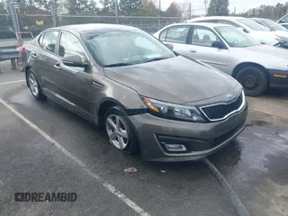 2015 Kia Optima LX with VIN 5XXGM4A72FG400848, listed as a IAAI auction lot 40802198 with 173,270 mi miles and . Bid and sale history available at DreamBid. Image 1.