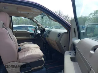 2005 Ford F-150 XLT with VIN 1FTPX14575KD79404, listed as a IAAI auction lot 42003073 with 212,050 mi miles. Bid and sale history available at carsss.com. Image 5.