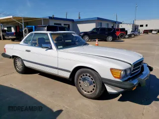 1987 Mercedes-Benz 560 SL with VIN WDBBA48D8HA068748, listed as a Copart auction lot 46874285 with 58,817 mi miles and Clean Title. Bid and sale history available at DreamBid. Image 4.