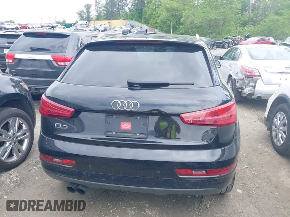 2016 Audi Q3 Premium Plus with VIN WA1BFCFSXGR022587, listed as a IAAI auction lot 42133288 with 141,609 mi miles. Bid and sale history available at carsss.com. Image 16.