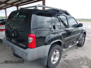 2003 Nissan Xterra XE with VIN 5N1ED28T13C701018, listed as a IAAI auction lot 42113402 with 198,373 mi miles and . Bid and sale history available at carsss.com. Image 4.