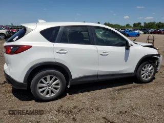 2014 Mazda CX-5 Touring with VIN JM3KE2CY9E0305244, listed as a Copart auction lot 56205605 with 164,516 mi miles and Salvage Title. Bid and sale history available at DreamBid. Image 3.