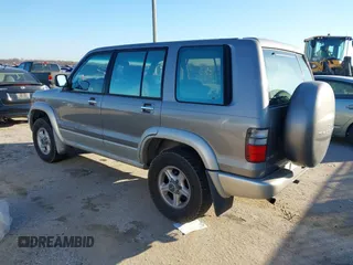 2002 Isuzu Trooper S z VIN JACDS58X227J01706, wystawiony jako IAAI lot #41489087 z przebiegiem 197 538 mil mil oraz . Historia ofert i sprzedaży dostępna na DreamBid. Obrazek 3.