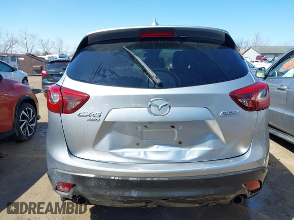 2016 Mazda CX-5 Grand Touring with VIN JM3KE4DY9G0795360, listed as a IAAI auction lot 41933991 with 176,373 mi miles. Bid and sale history available at carsss.com. Image 16.