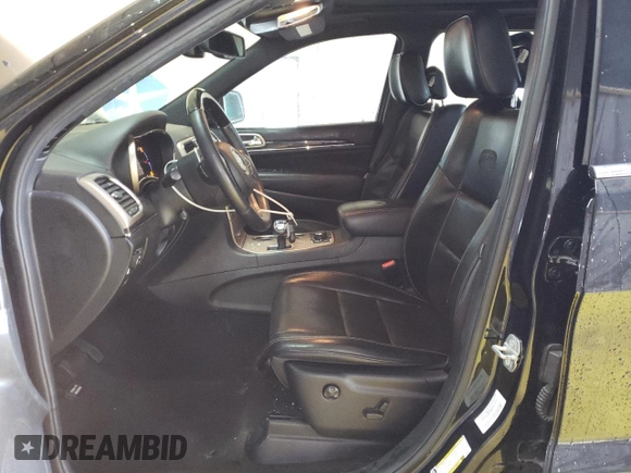 2015 Jeep Grand Cherokee Overland with VIN 1C4RJFCG8FC653117, listed as a Copart auction lot 49254595 with 142,359 mi miles and Clean Title. Bid and sale history available at carsss.com. Image 7.