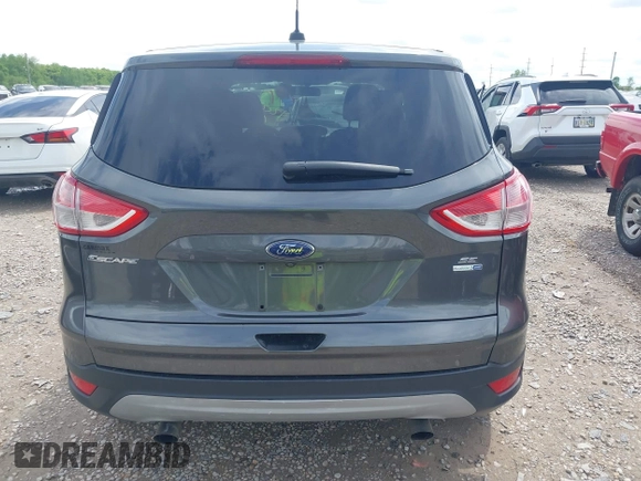 2016 Ford Escape SE with VIN 1FMCU9GXXGUC81604, listed as a IAAI auction lot 42222349 with 106,188 mi miles and . Bid and sale history available at DreamBid. Image 16.