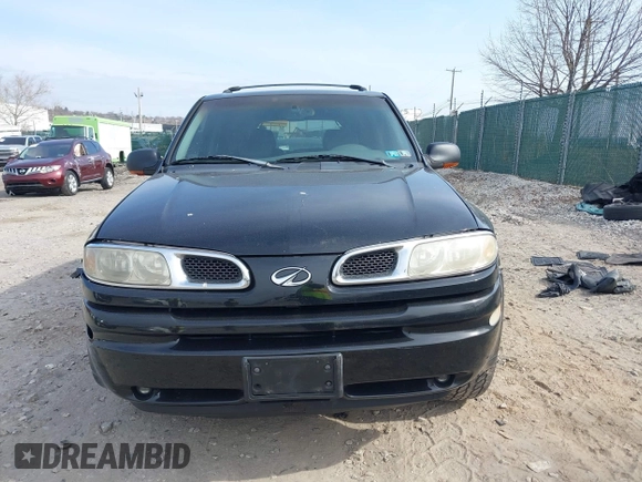 2002 Oldsmobile Bravada z VIN 1GHDT13S222469507, wystawiony jako IAAI lot #41787362 z przebiegiem Nie podano mil oraz . Historia ofert i sprzedaży dostępna na DreamBid. Obrazek 11.