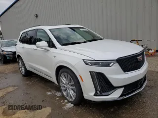 2021 Cadillac XT6 AWD Sport z VIN 1GYKPHRS4MZ209583, wystawiony jako Copart lot #66305562 z przebiegiem 19 570 mil mil oraz . Historia ofert i sprzedaży dostępna na DreamBid. Obrazek 1.