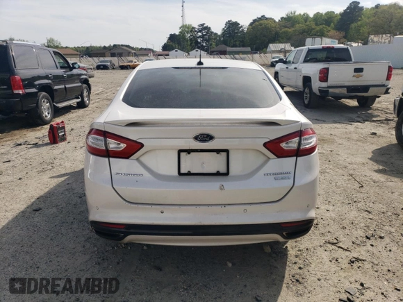 2014 Ford Fusion Titanium с VIN 3FA6P0K99ER290334, выставлен на аукционе Copart как лот 54534895 с пробегом 210 149 миль миль и Списание • Salvage title. История ставок и продаж доступна на DreamBid. Изображение 6.