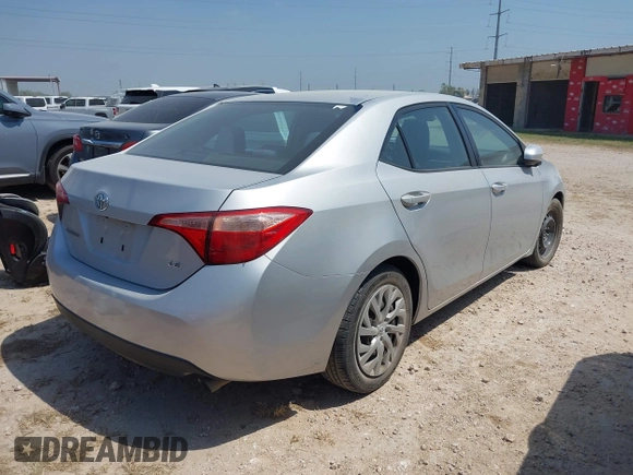 2018 Toyota Corolla L with VIN 2T1BURHE1JC986244, listed as a IAAI auction lot 41942626 with Not provided miles and . Bid and sale history available at DreamBid. Image 4.