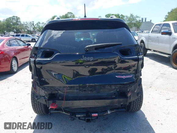 2017 Jeep Cherokee Trailhawk with VIN 1C4PJMBS9HW537962, listed as a IAAI auction lot 42002460 with 129,037 mi miles and . Bid and sale history available at DreamBid. Image 17.