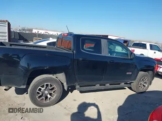 2016 GMC Canyon 4WD SLE with VIN 1GTG6CE30G1381435, listed as a IAAI auction lot 41642964 with 130,490 mi miles. Bid and sale history available at carsss.com. Image 14.