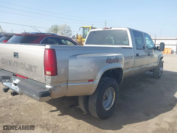 2000 Chevrolet C/K 3500 Crew Cab with VIN 1GCHK33J0YF437640, listed as a IAAI auction lot 41796214 with NaN miles. Bid and sale history available at carsss.com. Image 4.