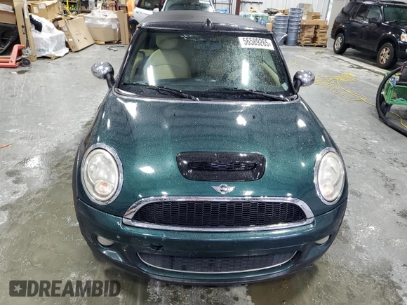 2010 MINI Convertible S with VIN WMWMS3C54ATY51980, listed as a Copart auction lot 56589265 with 147,136 mi miles and Salvage title. Bid and sale history available at DreamBid. Image 5.
