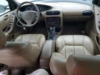 1999 Chrysler Cirrus LXi z VIN 1C3EJ56H6XN540760, wystawiony jako Copart lot #51510505 z przebiegiem Nie podano mil oraz Czysty tytuł • Clean title. Historia ofert i sprzedaży dostępna na DreamBid. Obrazek 8.