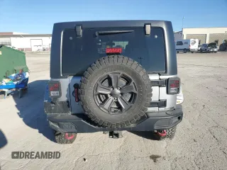 2018 Jeep Wrangler JK Unlimited Rubicon with VIN 1C4BJWFG2JL822814, listed as a Copart auction lot 81669734 with 71,040 mi miles and Salvage Title. Bid and sale history available at carsss.com. Image 6.