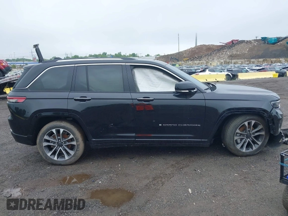 2023 Jeep Grand Cherokee Overland with VIN 1C4RJHDG2PC516797, listed as a IAAI auction lot 42026063 with 25,808 mi miles and . Bid and sale history available at DreamBid. Image 12.