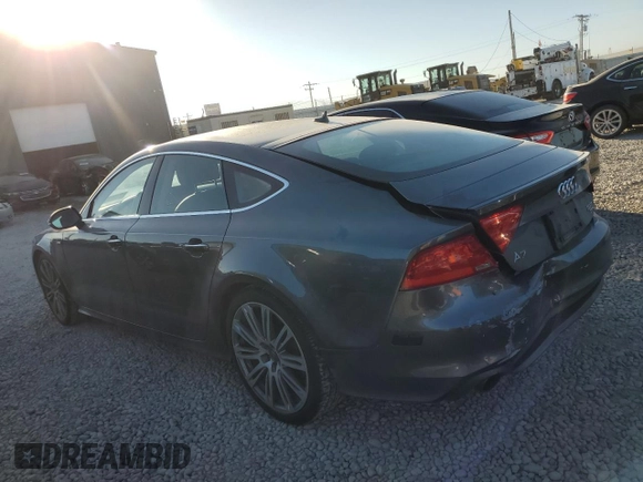 2014 Audi A7 Prestige with VIN WAU2GAFC3EN054198, listed as a Copart auction lot 73588924 with 99,048 mi miles and Salvage title. Bid and sale history available at DreamBid. Image 2.