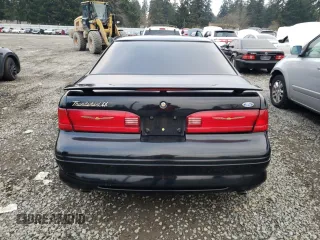 1997 Ford Thunderbird LX with VIN 1FALP62W1VH110468, listed as a Copart auction lot 88331705 with 84,349 mi miles and Salvage Title. Bid and sale history available at DreamBid. Image 6.