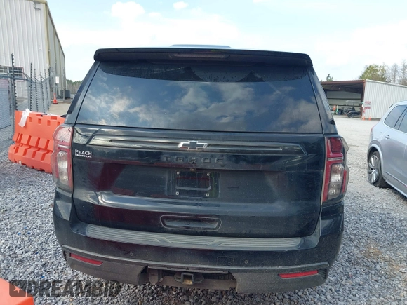 2021 Chevrolet Tahoe Z71 with VIN 1GNSKPKD8MR122190, listed as a IAAI auction lot 41587419 with 106,828 mi miles and . Bid and sale history available at DreamBid. Image 16.