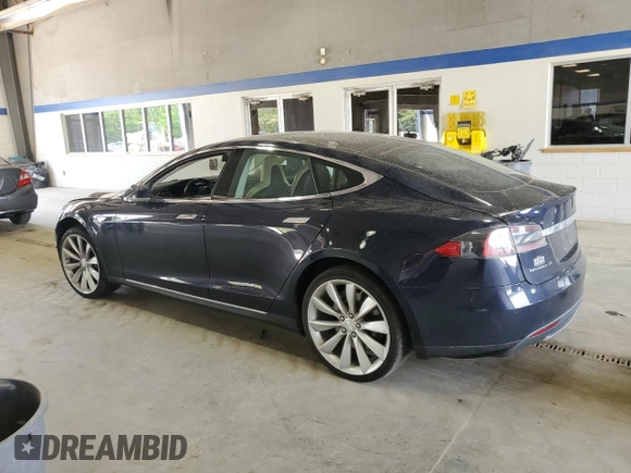 2014 Tesla Model S 60 with VIN 5YJSA1H10EFP52850, listed as a Copart auction lot 54321805 with 58,031 mi miles and Salvage Title. Bid and sale history available at DreamBid. Image 2.