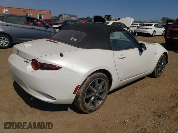 2020 Mazda MX-5 Miata Grand Touring z VIN JM1NDAD7XL0412292, wystawiony jako Copart lot #69792894 z przebiegiem 19 513 mil mil oraz Szkoda całkowita • Salvage title. Historia ofert i sprzedaży dostępna na DreamBid. Obrazek 3.