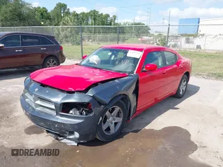 2010 Dodge Charger SXT with VIN 2B3CA3CV7AH302306, listed as a IAAI auction lot 42105542 with 83,313 mi miles and . Bid and sale history available at carsss.com. Image 2.