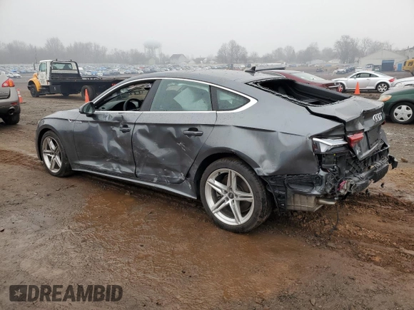 2021 Audi A5 Sportback S line Premium Plus with VIN WAUFACF52MA042095, listed as a Copart auction lot 42948603 with 7,409 mi miles. Bid and sale history available at carsss.com. Image 2.