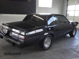 1986 Buick Regal with VIN 1G4GK4771GP428305, listed as a Copart auction lot 45335065 with 943 mi miles and Clean Title. Bid and sale history available at DreamBid. Image 3.