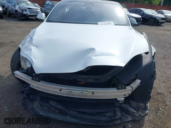 2022 Tesla Model S with VIN 5YJSA1E58NF467644, listed as a IAAI auction lot 42344403 with 52,628 mi miles and . Bid and sale history available at DreamBid. Image 20.