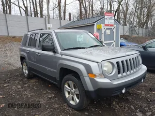 2014 Jeep Patriot Sport with VIN 1C4NJRBB4ED886605, listed as a IAAI auction lot 41935286 with 145,215 mi miles. Bid and sale history available at carsss.com. Image 1.