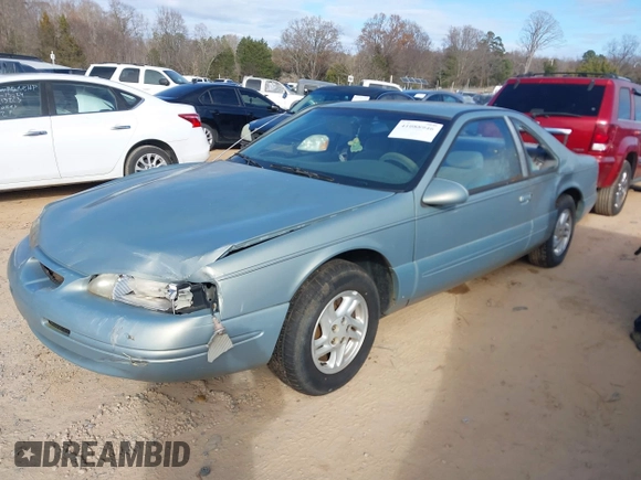 1997 Ford Thunderbird LX with VIN 1FALP6242VH127682, listed as a IAAI auction lot 41088946 with 88,769 mi miles and . Bid and sale history available at DreamBid. Image 2.