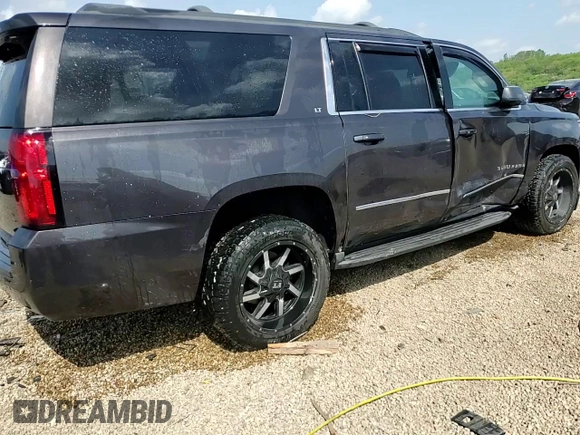 2016 Chevrolet Suburban LT z VIN 1GNSKHKC1GR198058, wystawiony jako Copart lot #56909335 z przebiegiem 150 907 mil mil oraz Szkoda całkowita • Salvage title. Historia ofert i sprzedaży dostępna na DreamBid. Obrazek 14.