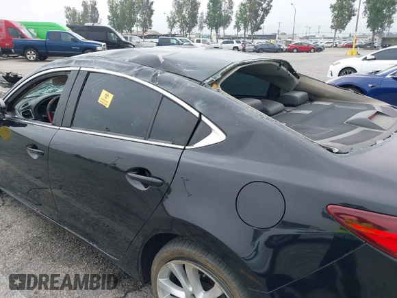 2014 Mazda 6 i Touring with VIN JM1GJ1T6XE1162480, listed as a IAAI auction lot 42150777 with 148,113 mi miles and . Bid and sale history available at DreamBid. Image 13.