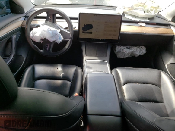 2023 Tesla Model 3 with VIN 5YJ3E1EA6PF454254, listed as a Copart auction lot 56881355 with 30,327 mi miles and Salvage title. Bid and sale history available at DreamBid. Image 8.