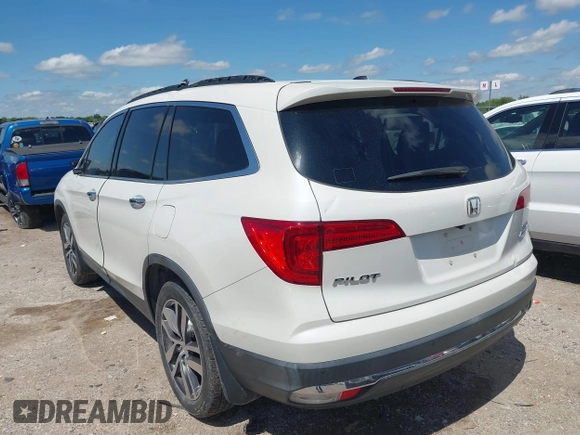 2017 Honda Pilot Touring with VIN 5FNYF6H92HB054145, listed as a IAAI auction lot 42200391 with 70,096 mi miles and . Bid and sale history available at DreamBid. Image 3.