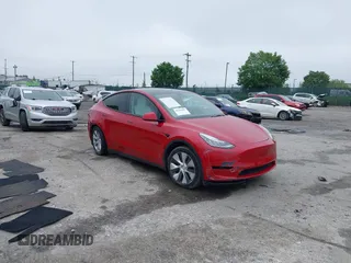 2022 Tesla Model Y Long Range z VIN 7SAYGDEE4NF379574, wystawiony jako IAAI lot #42263382 z przebiegiem 77 539 mil mil oraz . Historia ofert i sprzedaży dostępna na DreamBid. Obrazek 1.