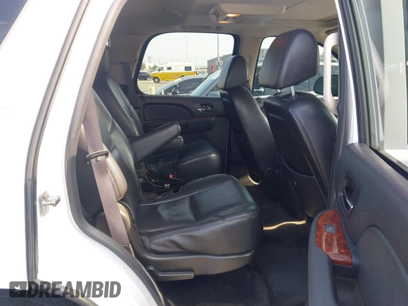 2013 Chevrolet Tahoe LTZ with VIN 1GNSKCE04DR374682, listed as a IAAI auction lot 42779526 with 139,533 mi miles and . Bid and sale history available at DreamBid. Image 8.