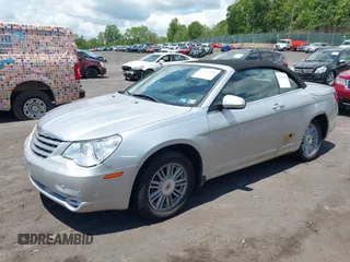 2009 Chrysler Sebring Touring z VIN 1C3LC55D79N539412, wystawiony jako IAAI lot #42382980 z przebiegiem 104 958 mil mil oraz . Historia ofert i sprzedaży dostępna na DreamBid. Obrazek 2.