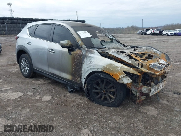 2023 Mazda CX-5 S Carbon Edition z VIN JM3KFBCMXP0265141, wystawiony jako IAAI lot #41946750 z przebiegiem Nie podano mil oraz . Historia ofert i sprzedaży dostępna na DreamBid. Obrazek 1.