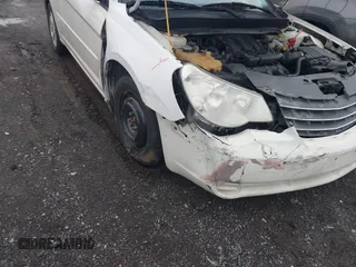 2008 Chrysler Sebring Touring with VIN 1C3LC55R08N260653, listed as a IAAI auction lot 41920159 with 114,543 mi miles and . Bid and sale history available at DreamBid. Image 6.